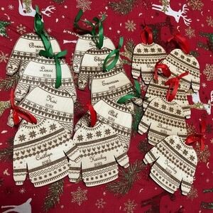 Festive Sweater Ornaments with Red and Green Ribbons